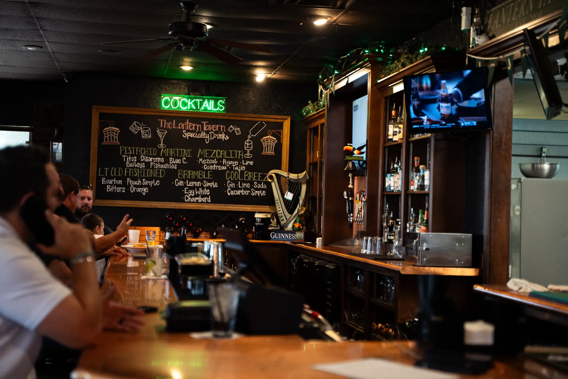 The Lantern Tavern bar with cocktail chalkboard